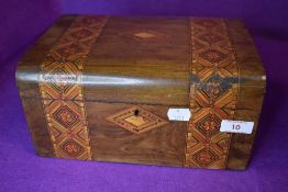 An antique inlaid marquetry box.
