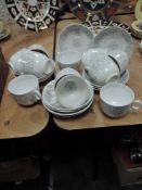 A porcelain part tea service having a frost design unmarked to base