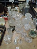 A selection of vintage clear cut and pressed glass wares including iridescent Loetz style vase