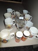 A selection of coronation ware and a pair of Beefeater Carlton ware salt and pepper pots