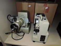 A Eumig P8 super 8mm film projector and similar slide viewer