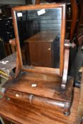 A 19th Century mahogany toilet mirror having drawer base