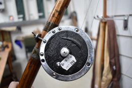 A Two piece oak rod and penn senator 11j reel