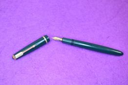 A Parker Victory fountain pen in green with single decorative band to cap having a Parker 10 nib.