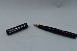 A Mabie Todd & Co Blackbird Self filler Leverfill fountain pen, in blue marble, with two narrow