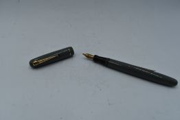 A Mabie Todd & Co Swan 3130 Self filler leverfill in grey with a single narrow gold bands to cap