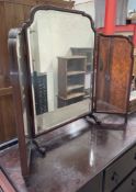 A walnut framed triptych dressing table mirror