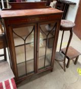 An Edwardian mahogany display cabinet together with a mahogany torchere and an oak table