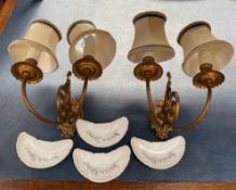 A pair of gilt metal twin branch wall lights together with a set of four continental porcelain