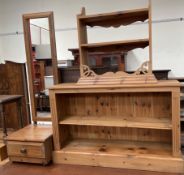 A pine bookcase together with a pine hanging shelves and a pine cheval mirror