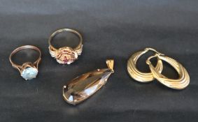 A pair of 14ct yellow gold hoop earrings together with a 14ct gold ruby set ring,