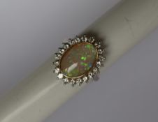 An opal and diamond dress ring,
