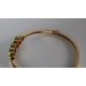 A 14ct yellow gold emerald and diamond set hinged bangle, - Image 3 of 4