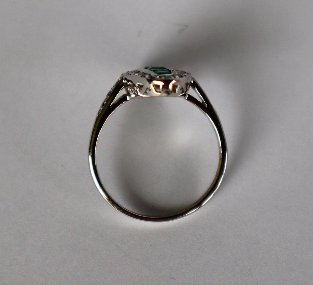 An emerald and diamond ring, of oval form, - Image 4 of 4