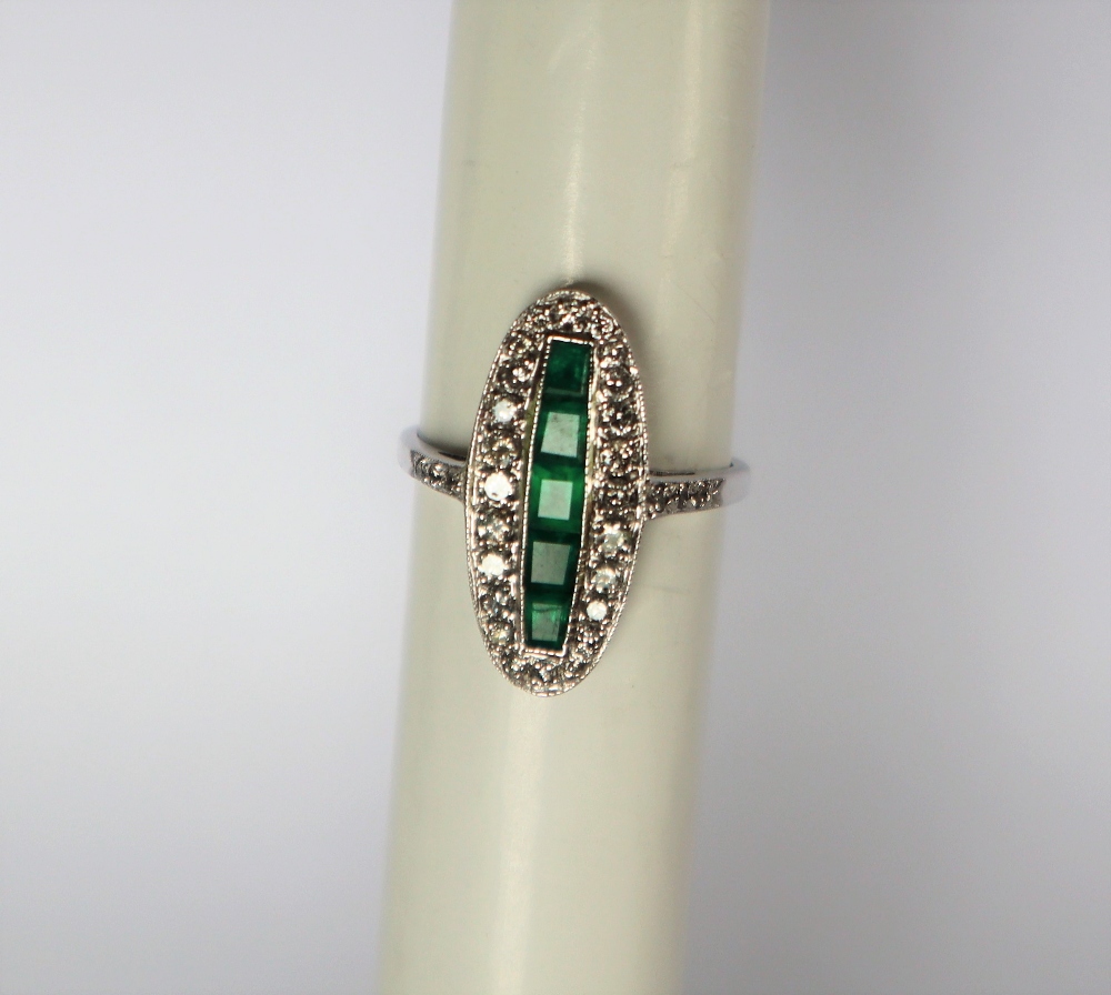 An emerald and diamond ring, of oval form, - Image 2 of 4