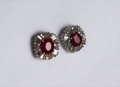 A pair of ruby and diamond earrings,