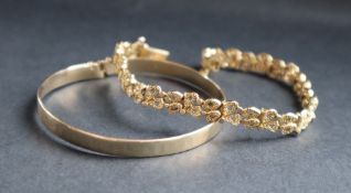 A 9ct yellow gold textured link bracelet, together with a 9ct gold slave bracelet, approximately 22.