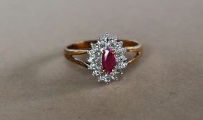 A 9ct yellow gold ruby and diamond cluster ring,