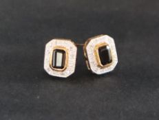 A pair of sapphire and diamond earrings,