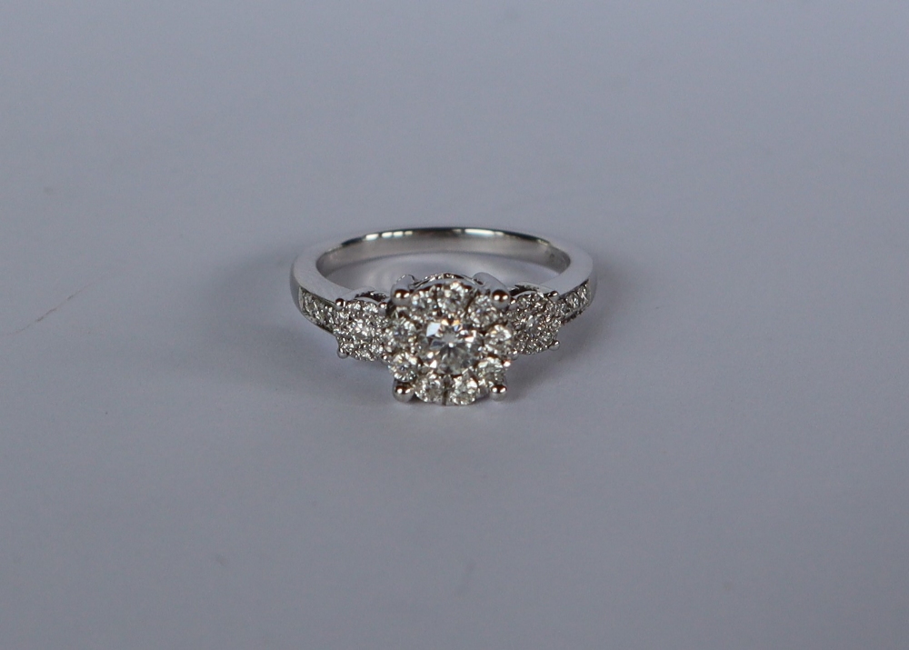 A diamond cluster ring set with a central round old cut diamond surrounded by nine round old cut - Image 2 of 4
