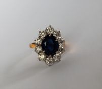 A sapphire and diamond cluster ring,