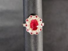 A ruby and diamond ring,