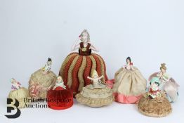 Eight Porcelain Miniature Dolls