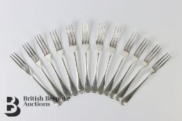 Twelve Silver Rat Tail Hanoverian Forks