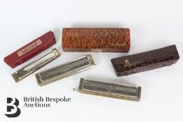 Three Vintage Hohner Harmonicas