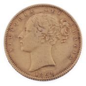 A Victorian shield back sovereign dated 1864
