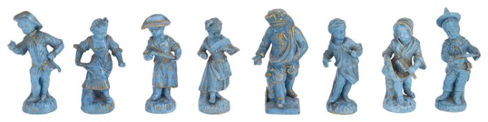 A collection of eight 19th c. Continental turquoise glazed and gilt decorated porcelain figures