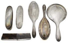 A George V silver six piece dressing table set