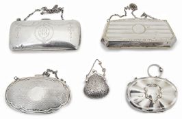 Four assorted silver coin purses and another silver plated example,
