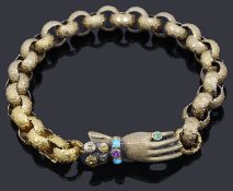 A Regency gold guard chain with gem set gloved hand clasp