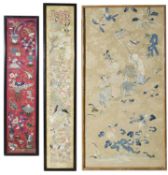 Three framed and glazed Chinese textiles