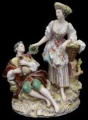 A late 19th/early 20th century porcelain figure group