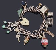A 9ct gold charm bracelet with padlock and assorted charms