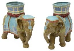 A pair of Victorian Royal Worcester majolica glazed elephants