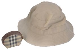 A Burberry canvas bucket shaped hat and coin purse