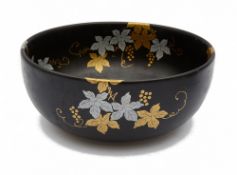 A Japanese black glazed porcelain bowl