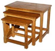 A Robert 'Mouseman' Thompson oak nest of three side tables,