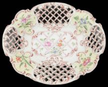 A mid 18th century Worcester yellow ground pierced dessert dish c.1765