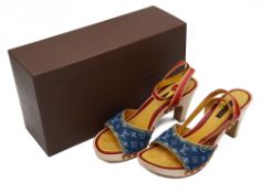A pair of Louis Vuitton blue denim sandals