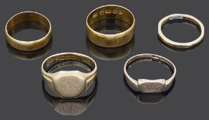 Two 22ct gold wedding bands and three other gold rings