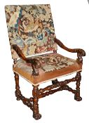 A late 17th century Flemish walnut and tapestry open armchair