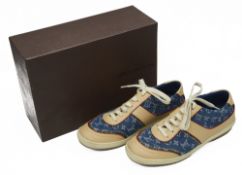 A pair of Louis Vuitton denim monogrammed trainers