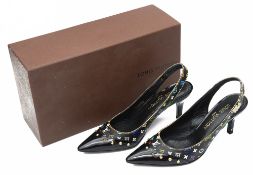 A pair of Louis Vuitton pumps