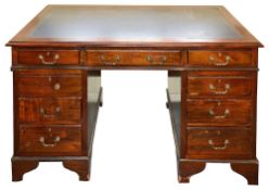 A large Victorian mahogany twin pedestal desk