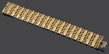 A Continental 18ct gold wide fancy articulated bracelet