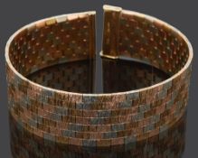 A three coloured 9ct gold textured brick link bracelet